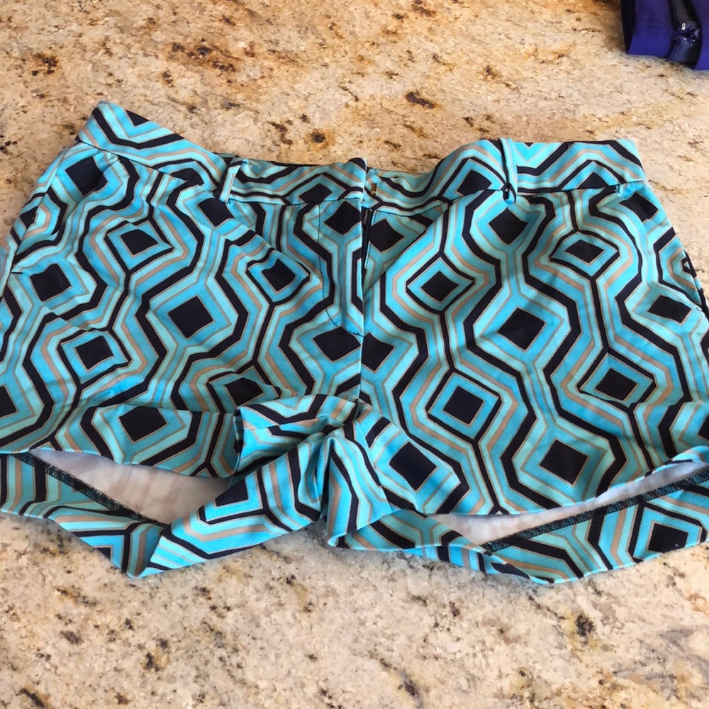 Michael Kors blue patterned shorts.